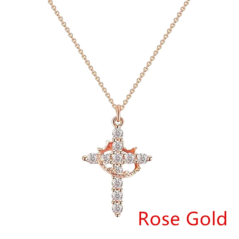 Crown cross necklace in rose gold with cubic zirconia