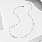 Dainty sideways cross necklace in gold or silver | Christian jewelry by Lunavrie