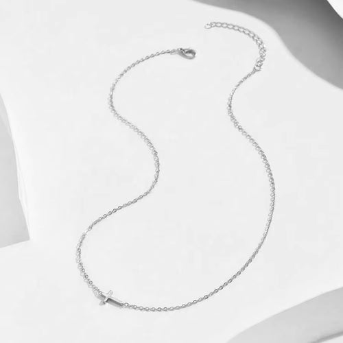 Dainty sideways cross necklace in gold or silver | Christian jewelry by Lunavrie